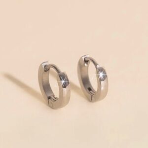 Mini hoop earrings. Snap closure and made for sensitive ears. By Oh Clem.